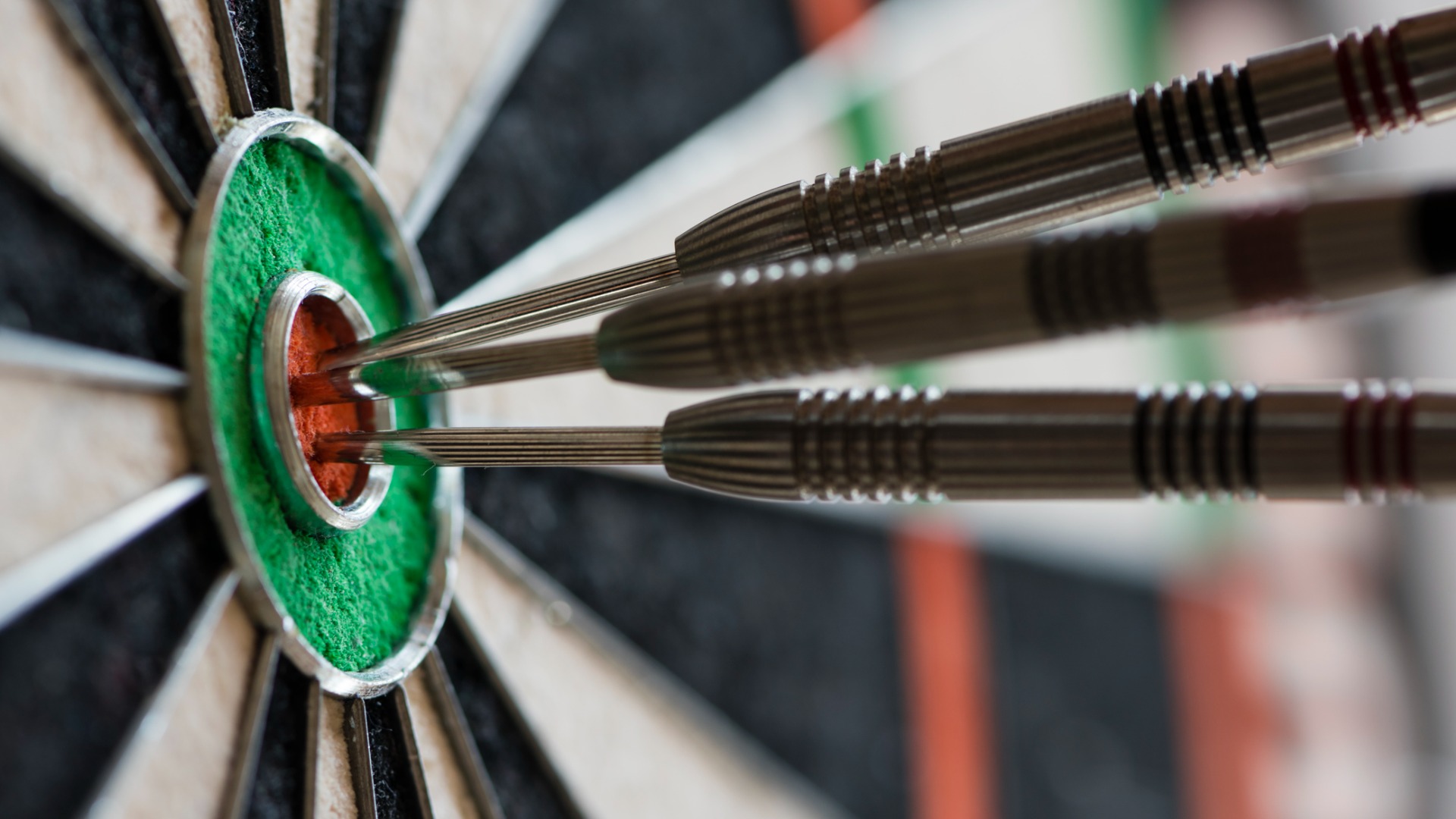 close up of bullseye on dartboard