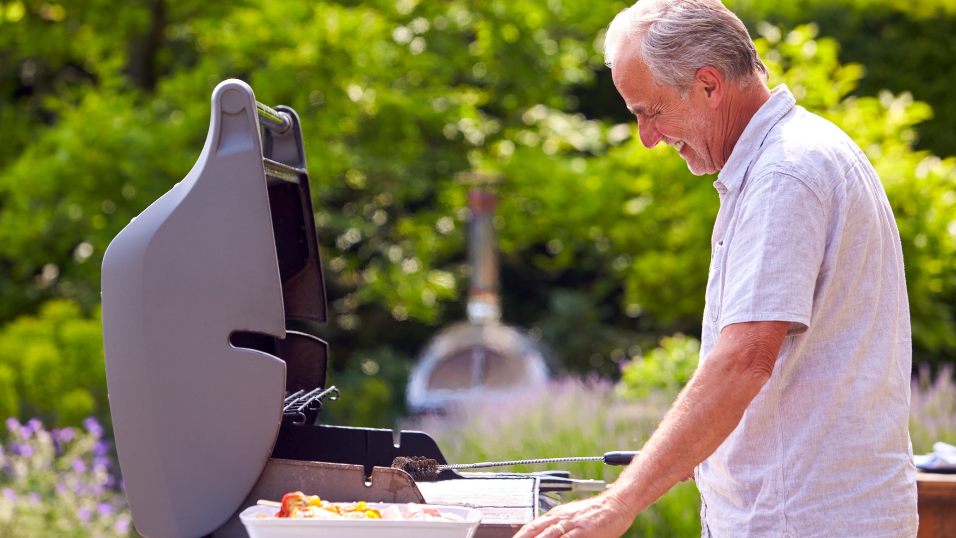 Man grilling outside