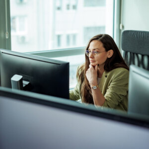 Young well dressed businesswoman working at the office